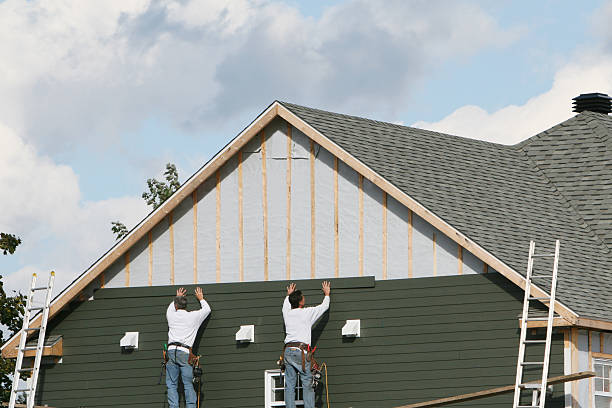 Professional Siding technician working in Bellevue, WA